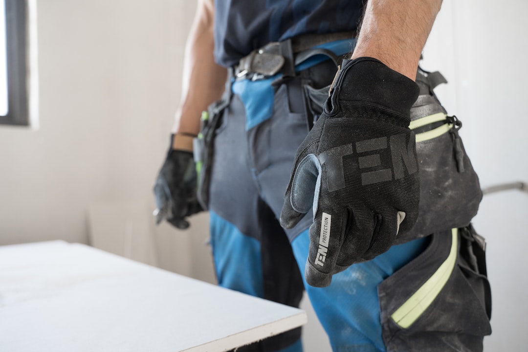 gallery-4 A carpenter with Ten Protection work gloves on waiting to do his work.